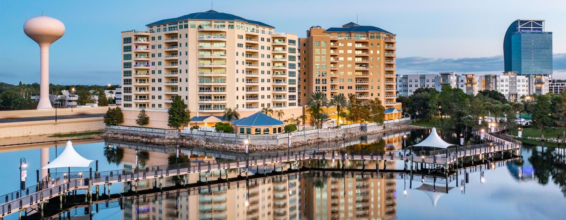 a body of water with buildings around it